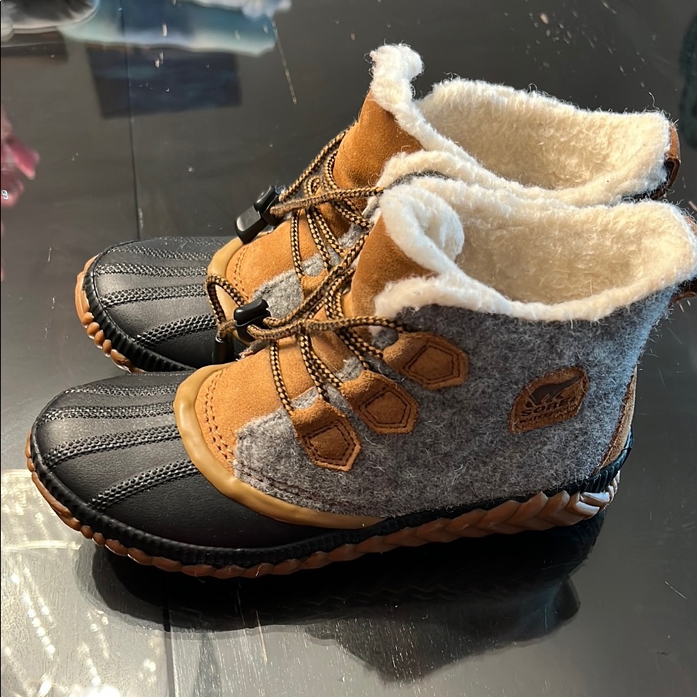 Sorel Black and Tan Boots with Waterproof Rubber and Cozy Lining